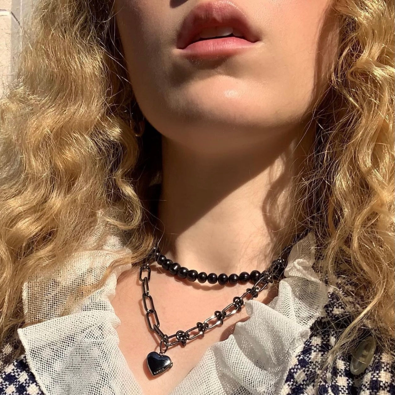 KNOTTED HEART LOCKET