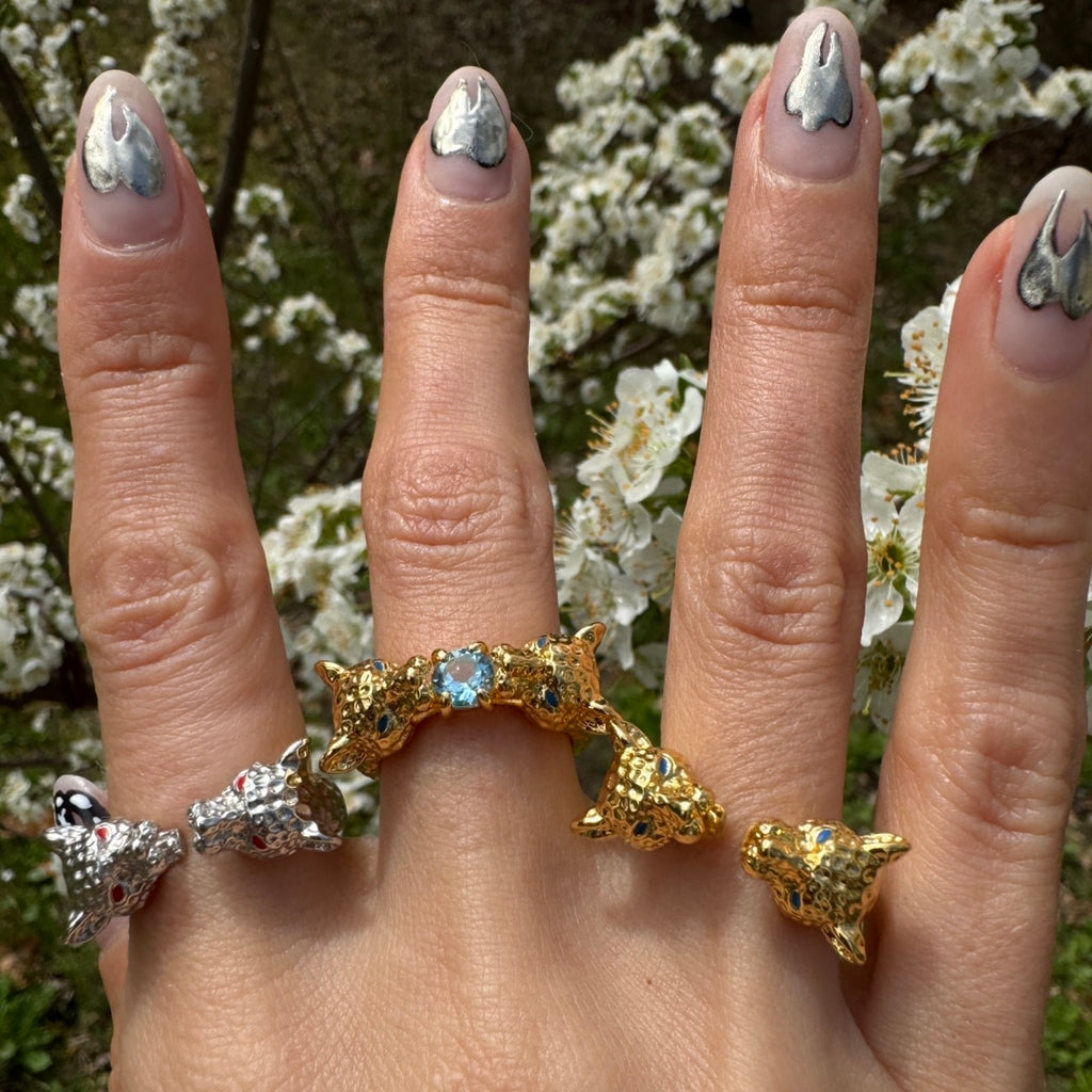 Double-headed leopard rings in gold brass and sterling silver with blue topaz, animal-inspired statement jewelry