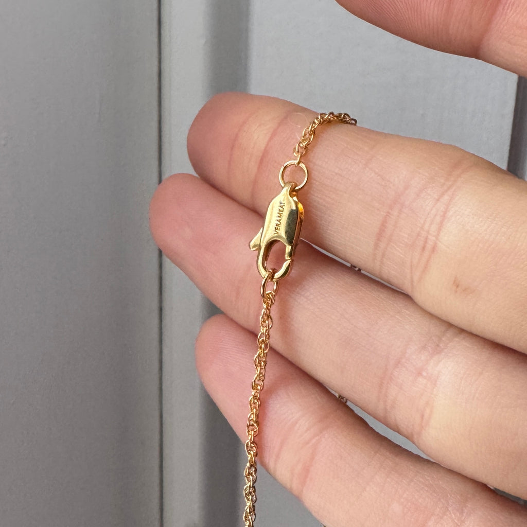 Gold heart claw ring clasp